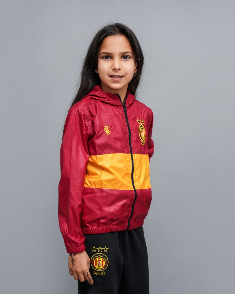 Veste Espérance Champions League enfant rouge et jaune avec logo EST